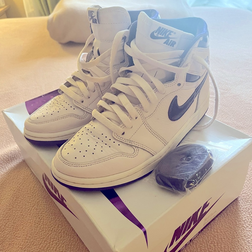 Purple and white Jordan 1s